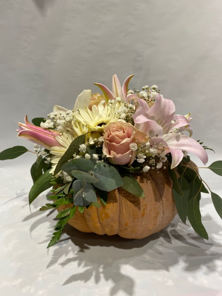 Composizione con zucca colori tenui